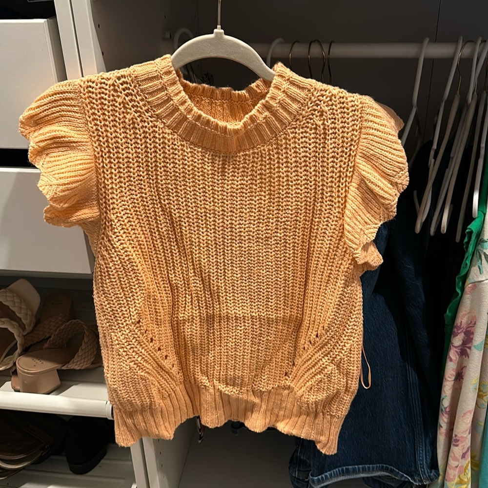 Knitted ruffle sweater